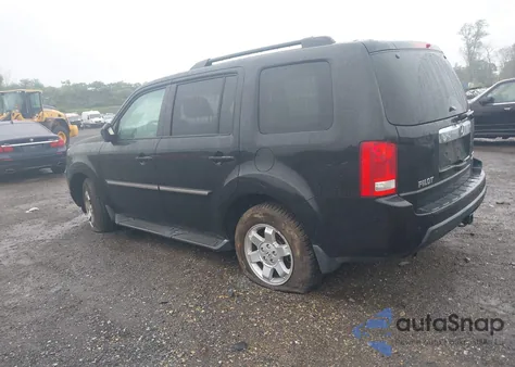 2010 Honda Pilot Touring z USA, uszkodzony, nr VIN 5FNYF4H84AB011640
